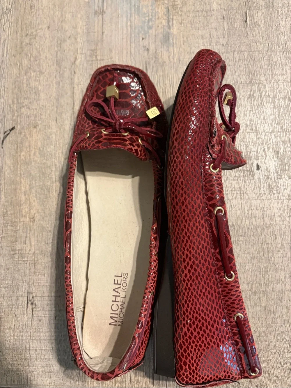 Michael Kors Burgundy Snake-Embossed Moccasin Flats with Gold Accents